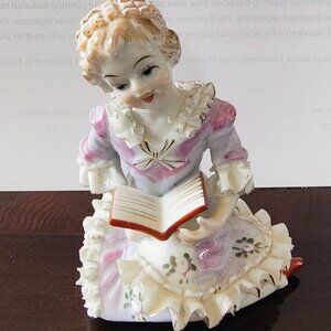 FIGURINE GIRL READING A  BOOK HAND DECORATED